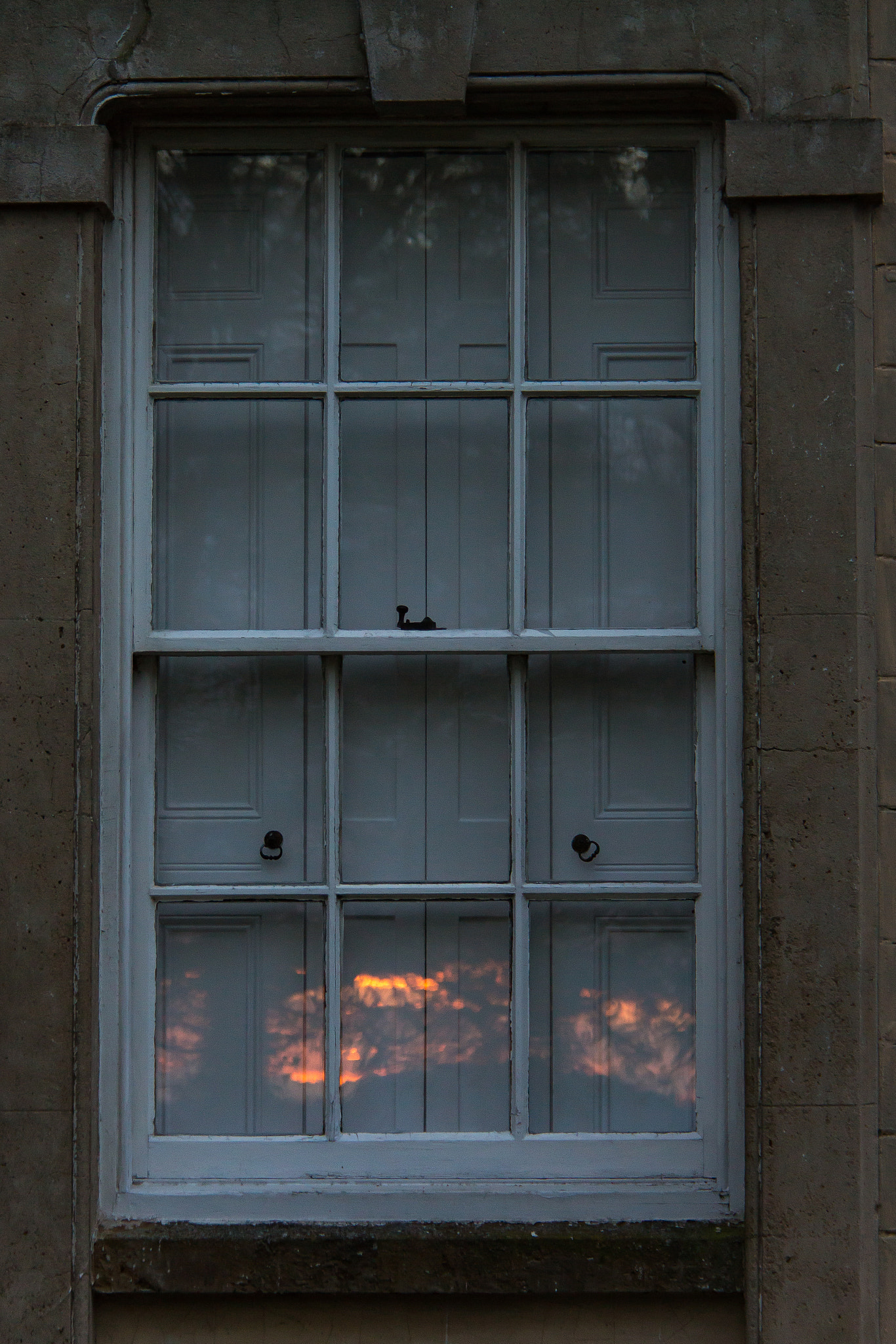 Canon EOS 700D (EOS Rebel T5i / EOS Kiss X7i) + Canon EF-S 18-200mm F3.5-5.6 IS sample photo. Sunset reflected in window photography