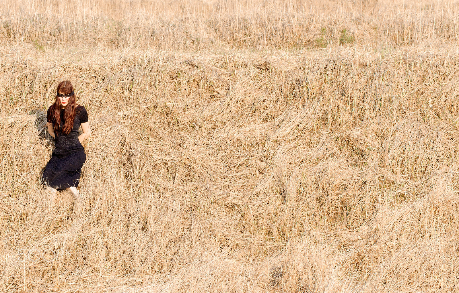 Canon EF 100mm F2.8L Macro IS USM sample photo. Woman in grass photography