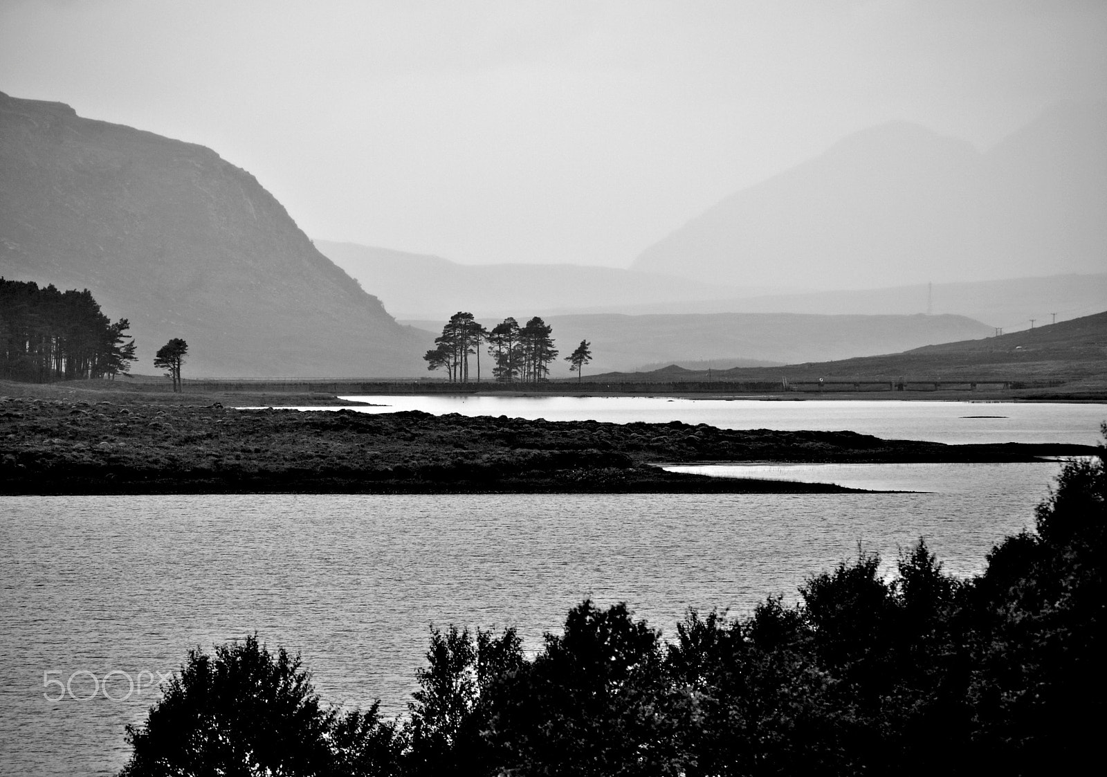 Panasonic Lumix DMC-G1 + Panasonic Lumix G Vario 45-200mm F4-5.6 OIS sample photo. Trees and loch photography