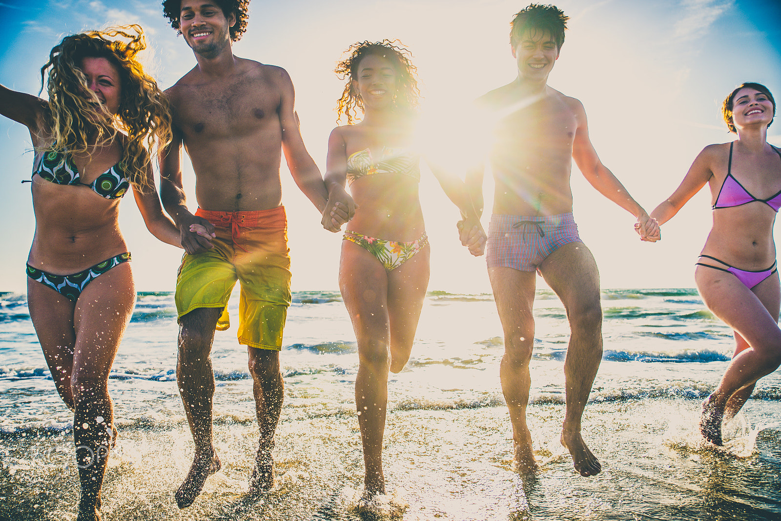 Nikon D610 sample photo. Friends running on the beach photography