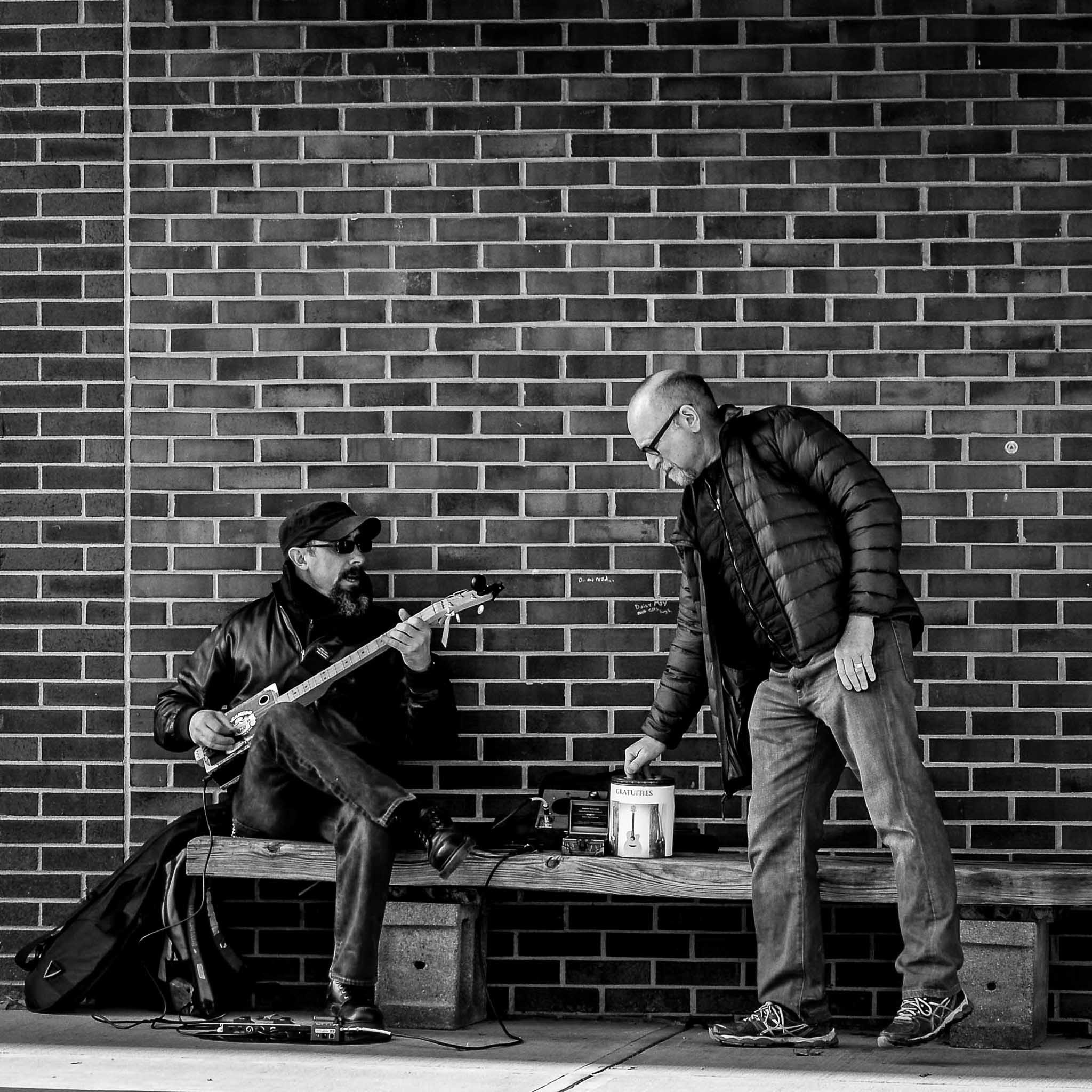 Nikon Df sample photo. Street musician with home made guitar photography