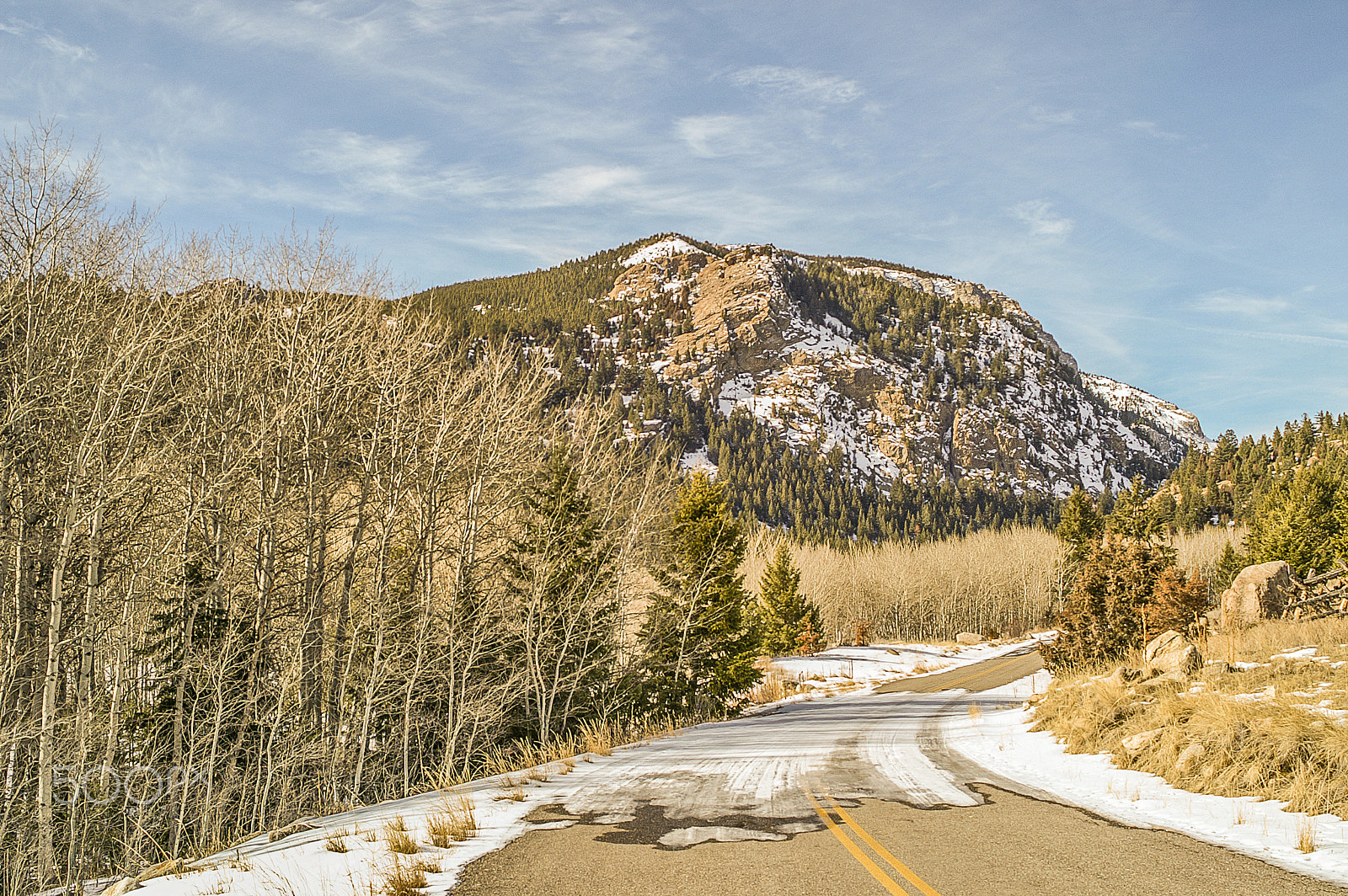 KONICA MINOLTA MAXXUM 7D sample photo. Patches of ice on two-lane road photography