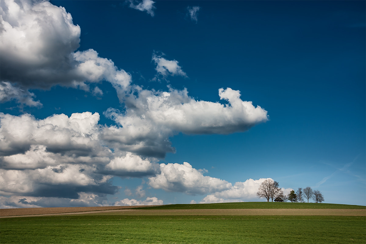 Canon EOS 40D + Sigma 18-200mm f/3.5-6.3 DC OS sample photo. Clouds photography