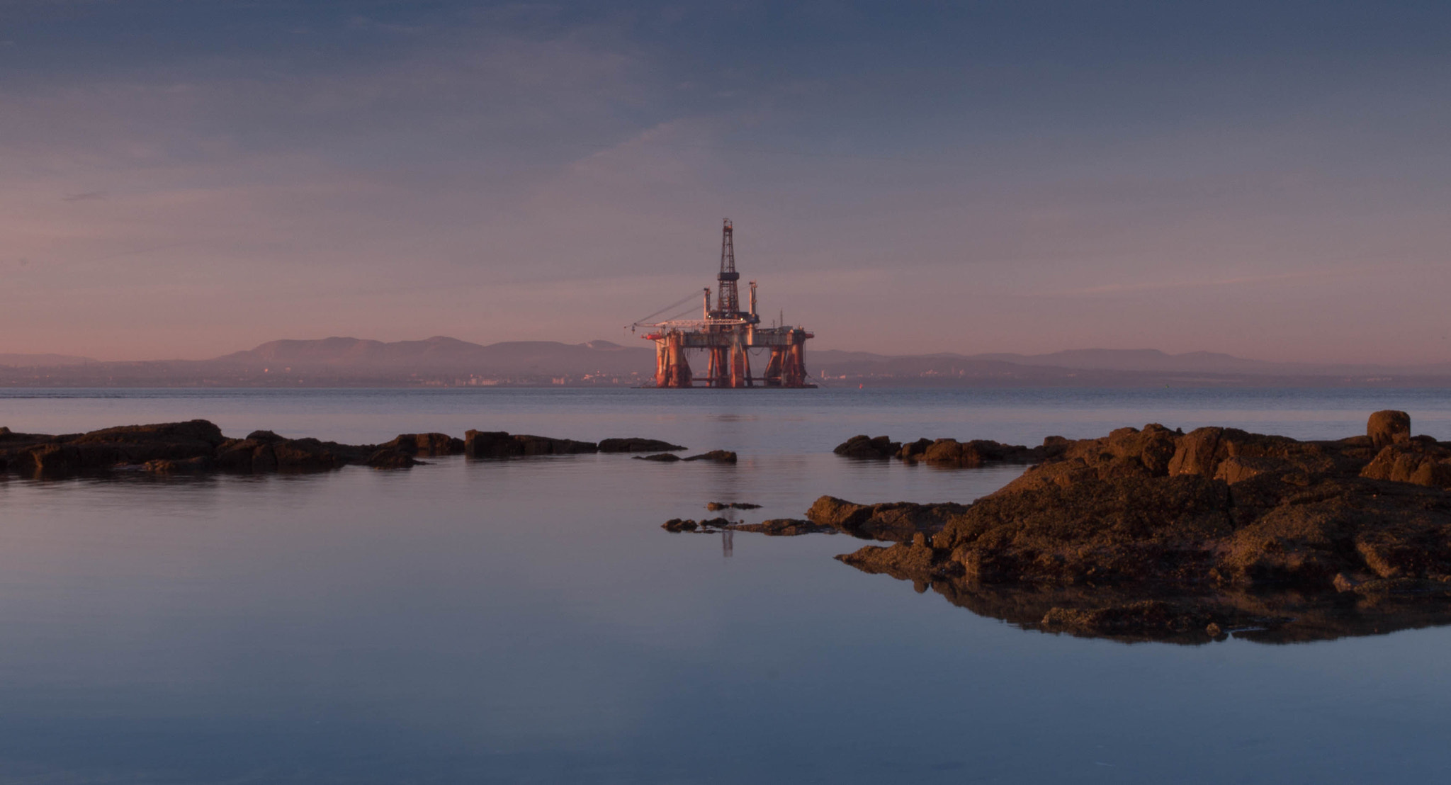 Canon EOS 1100D (EOS Rebel T3 / EOS Kiss X50) + Canon EF-S 24mm F2.8 STM sample photo. Oil rig at sunrise photography