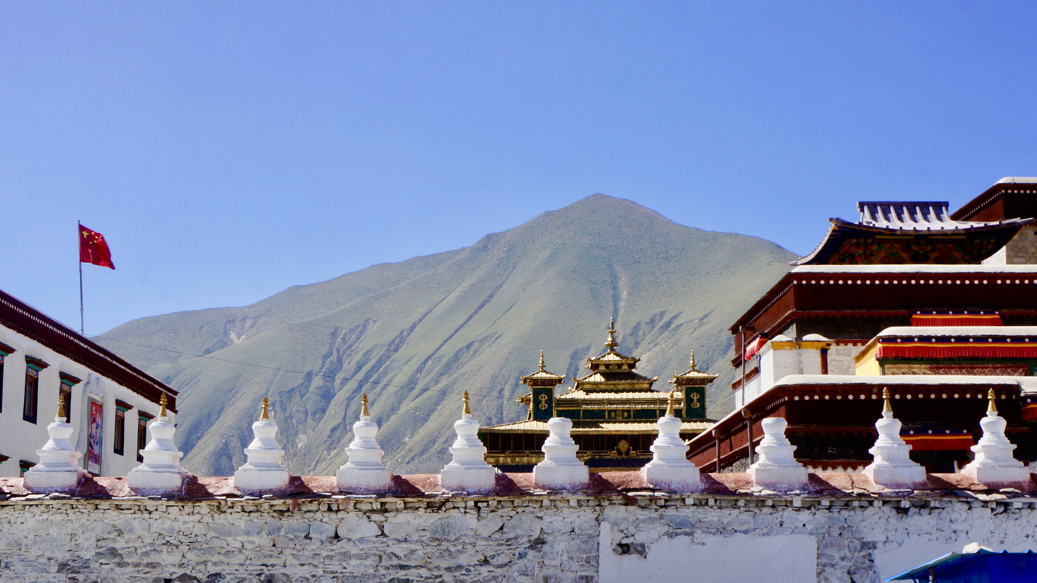 Sony Alpha NEX-5N + Tamron 18-200mm F3.5-6.3 Di III VC sample photo. Tibet temple photography