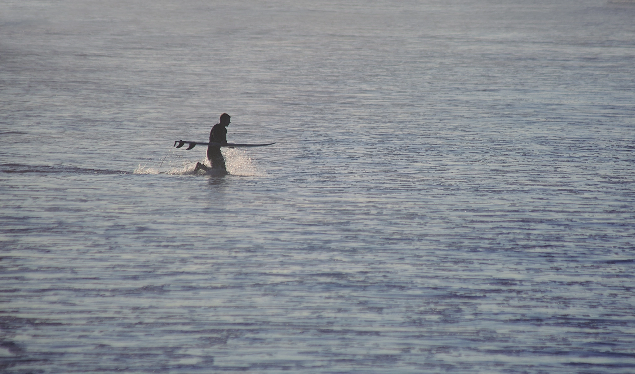 Canon EF 90-300mm F4.5-5.6 sample photo. The surfer photography