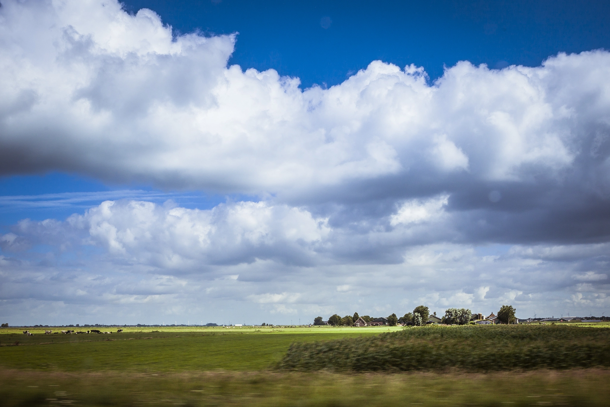 Sigma 24-70mm F2.8 EX DG Macro sample photo. Dutch clouds photography