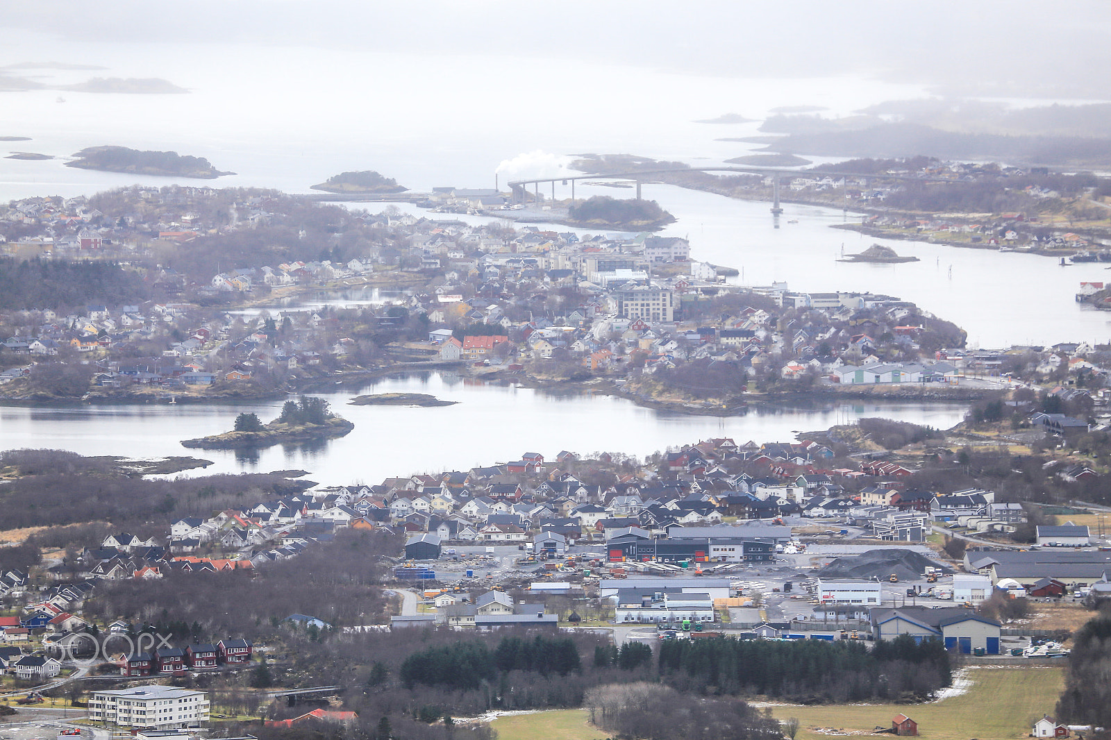 Canon EF 70-300mm F4-5.6L IS USM sample photo. On a day with fog over the city photography
