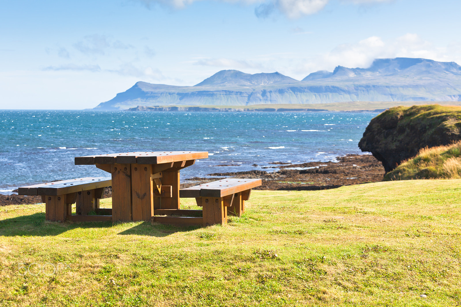 Canon EF 70-200mm F2.8L IS USM sample photo. Wooden table and benches in resting area photography