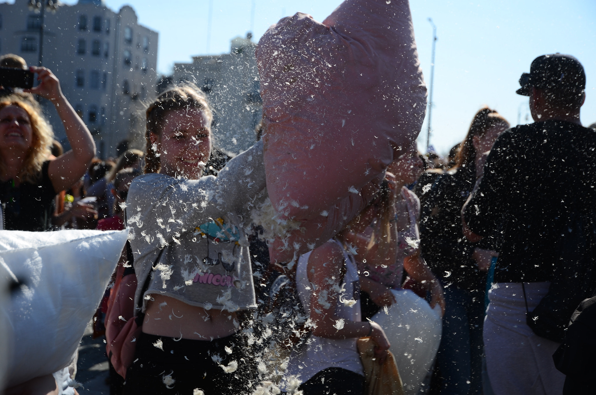 Nikon D7000 + Nikon AF-S DX Nikkor 16-85mm F3.5-5.6G ED VR sample photo. Pillow fight photography