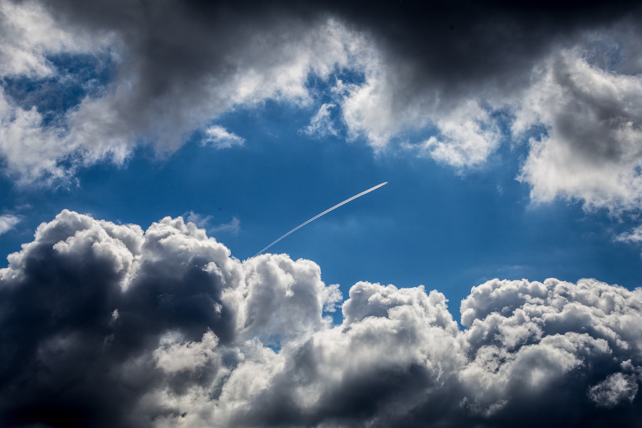 Canon EF 70-300mm F4-5.6L IS USM sample photo. Plane through the storm photography