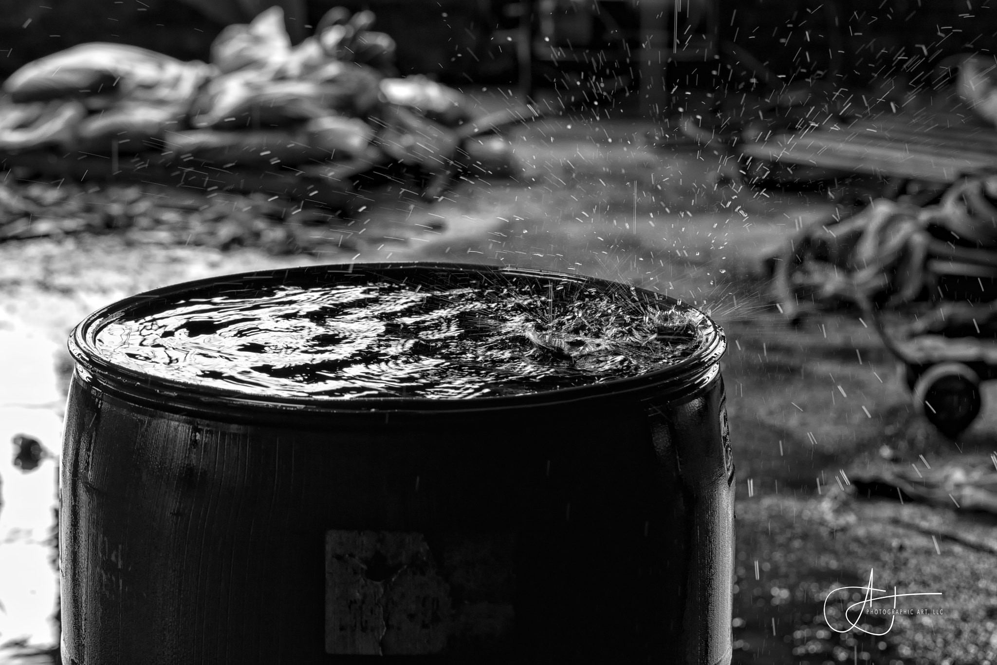 Canon EF 100mm F2.8L Macro IS USM sample photo. Dancing raindrops (1) [b&w] photography