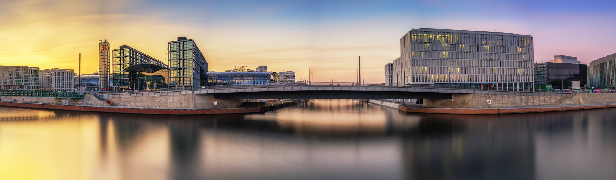 Sony a7 + E 50mm F2 sample photo. Golden hour in metropolis photography