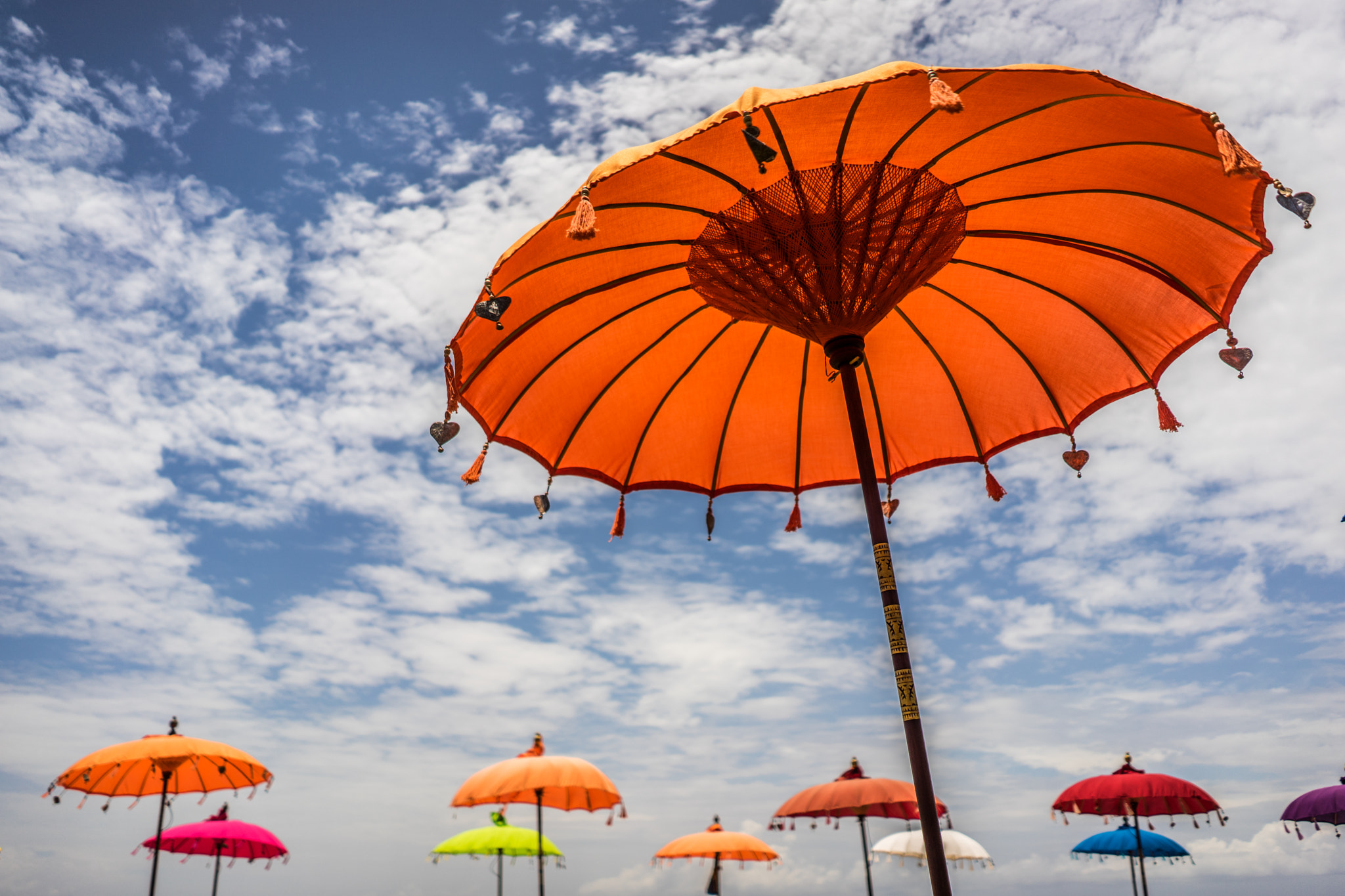 Sony a7 + Sony FE 28mm F2 sample photo. Happy umbrellas photography