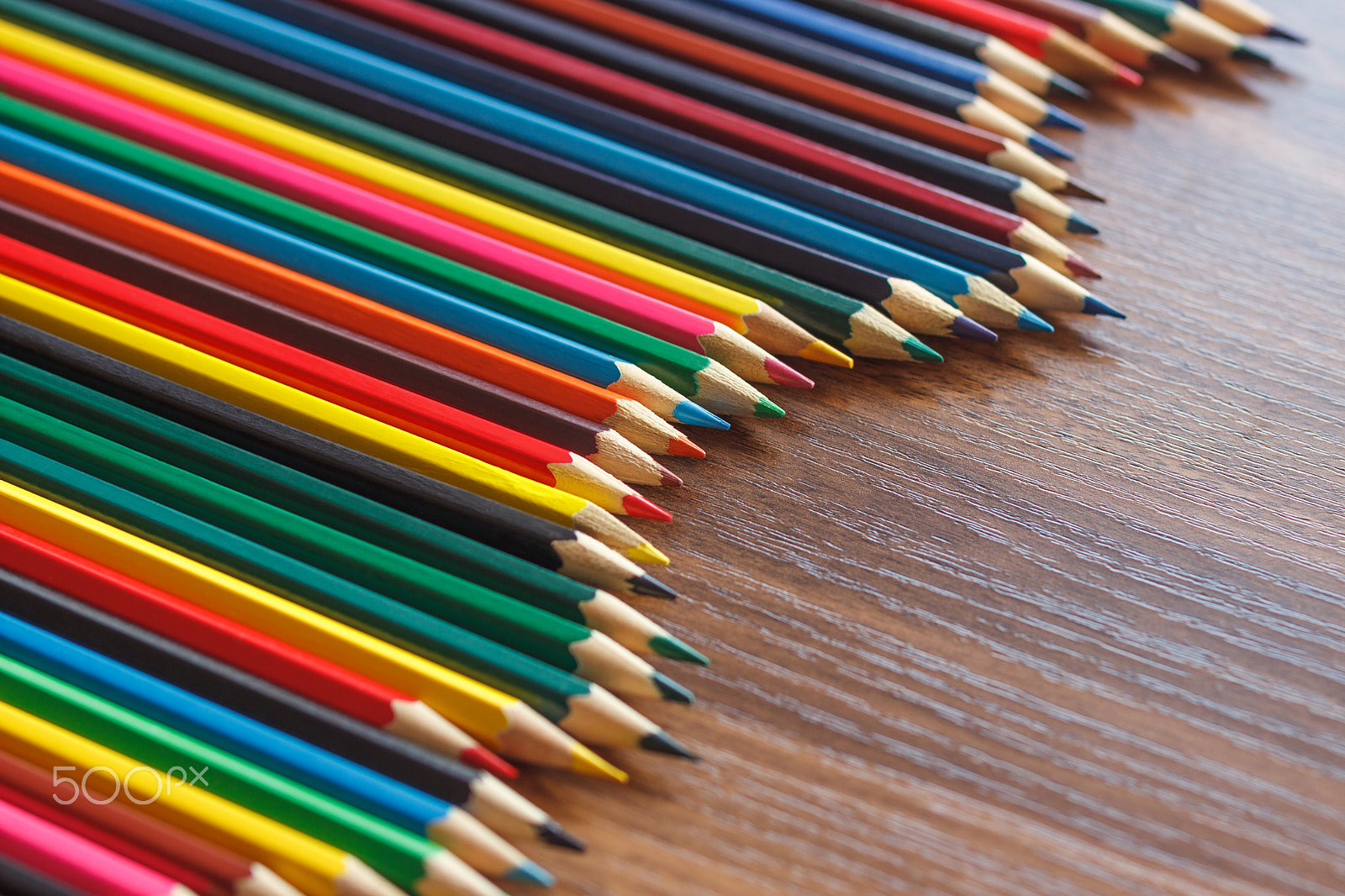 Canon EOS 600D (Rebel EOS T3i / EOS Kiss X5) + Canon EF 85mm F1.8 USM sample photo. Set of colored pencils, wooden background photography