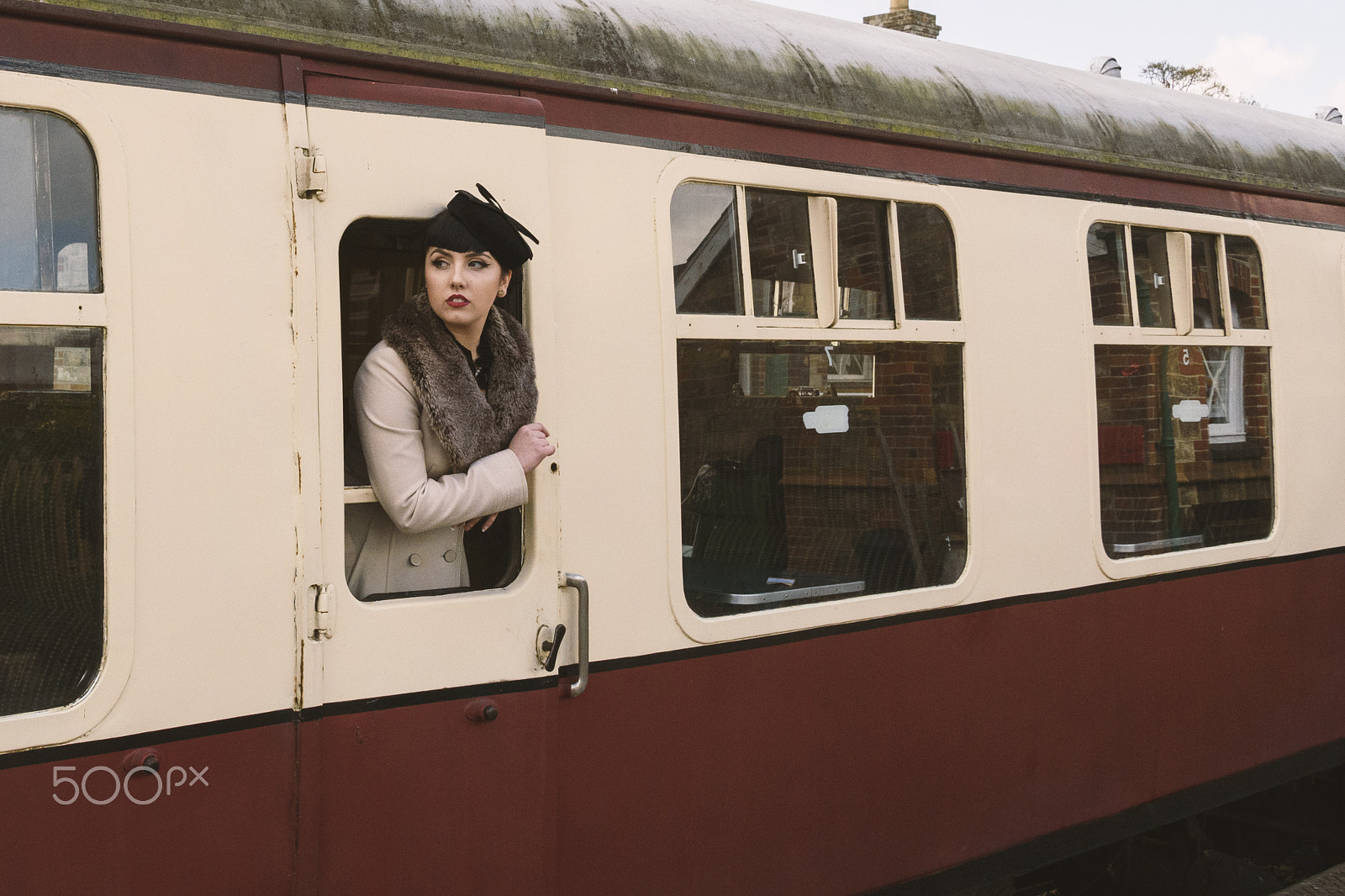 Sigma 17-50mm F2.8 EX DC OS HSM sample photo. Woman on train photography