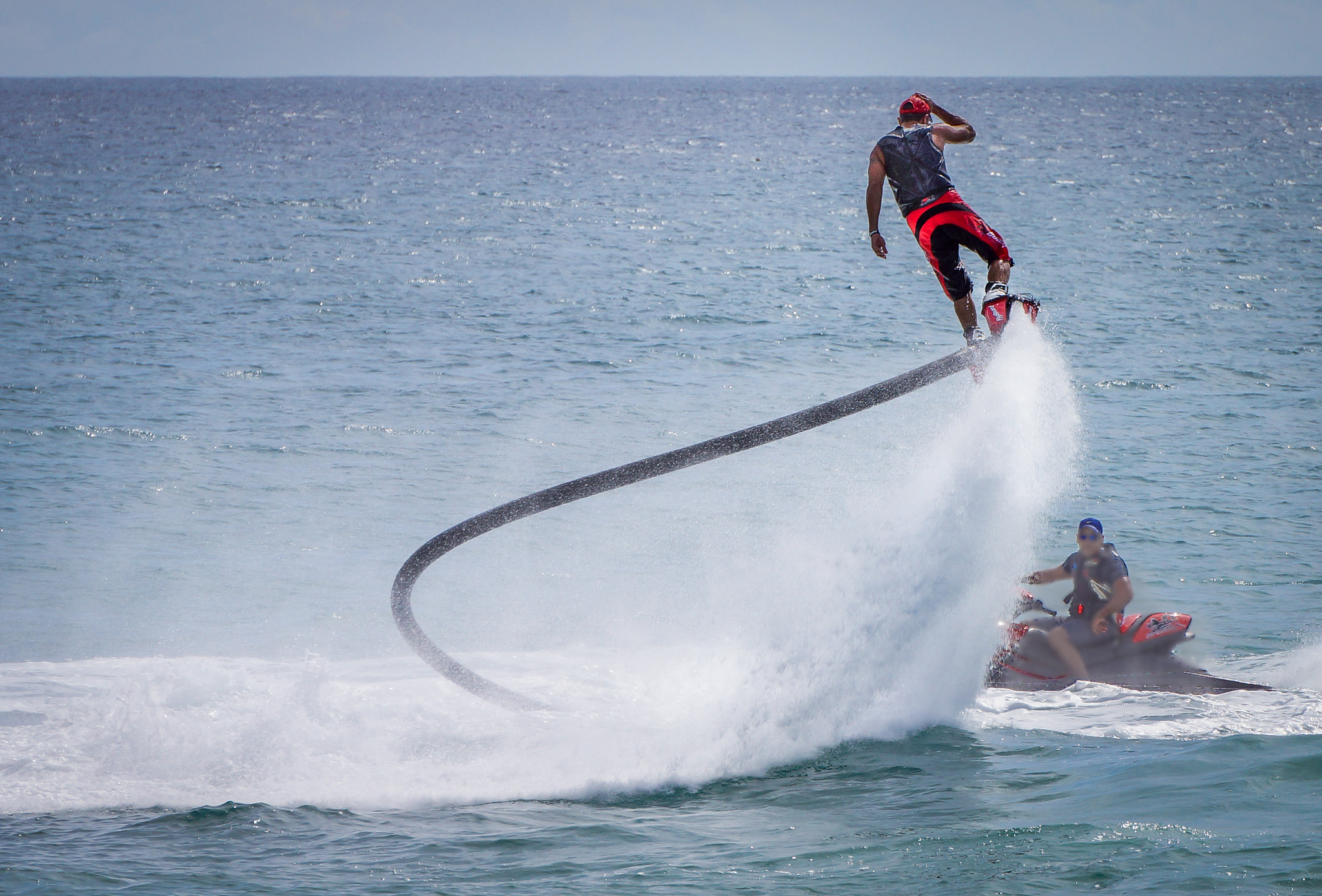 Sony Alpha NEX-7 + Sony E 55-210mm F4.5-6.3 OSS sample photo. Ocean flying photography