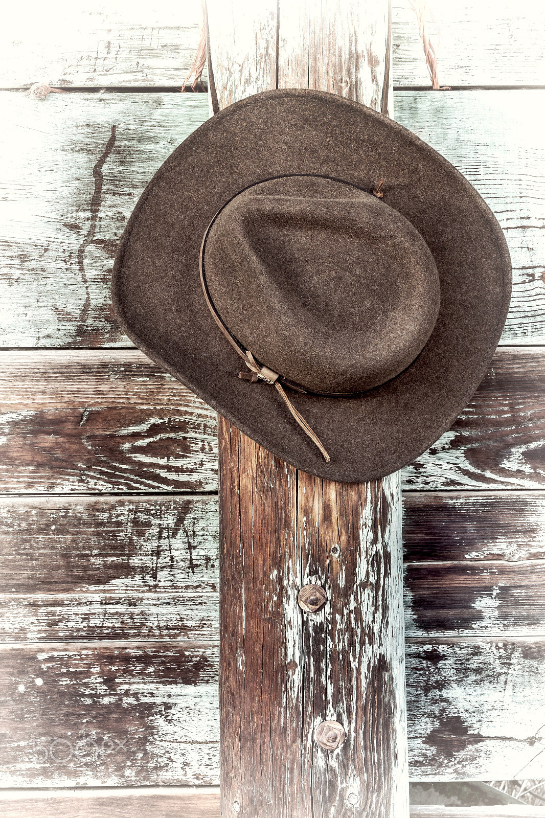 Canon EOS 40D sample photo. Felt cowboy hat on a corral fence photography