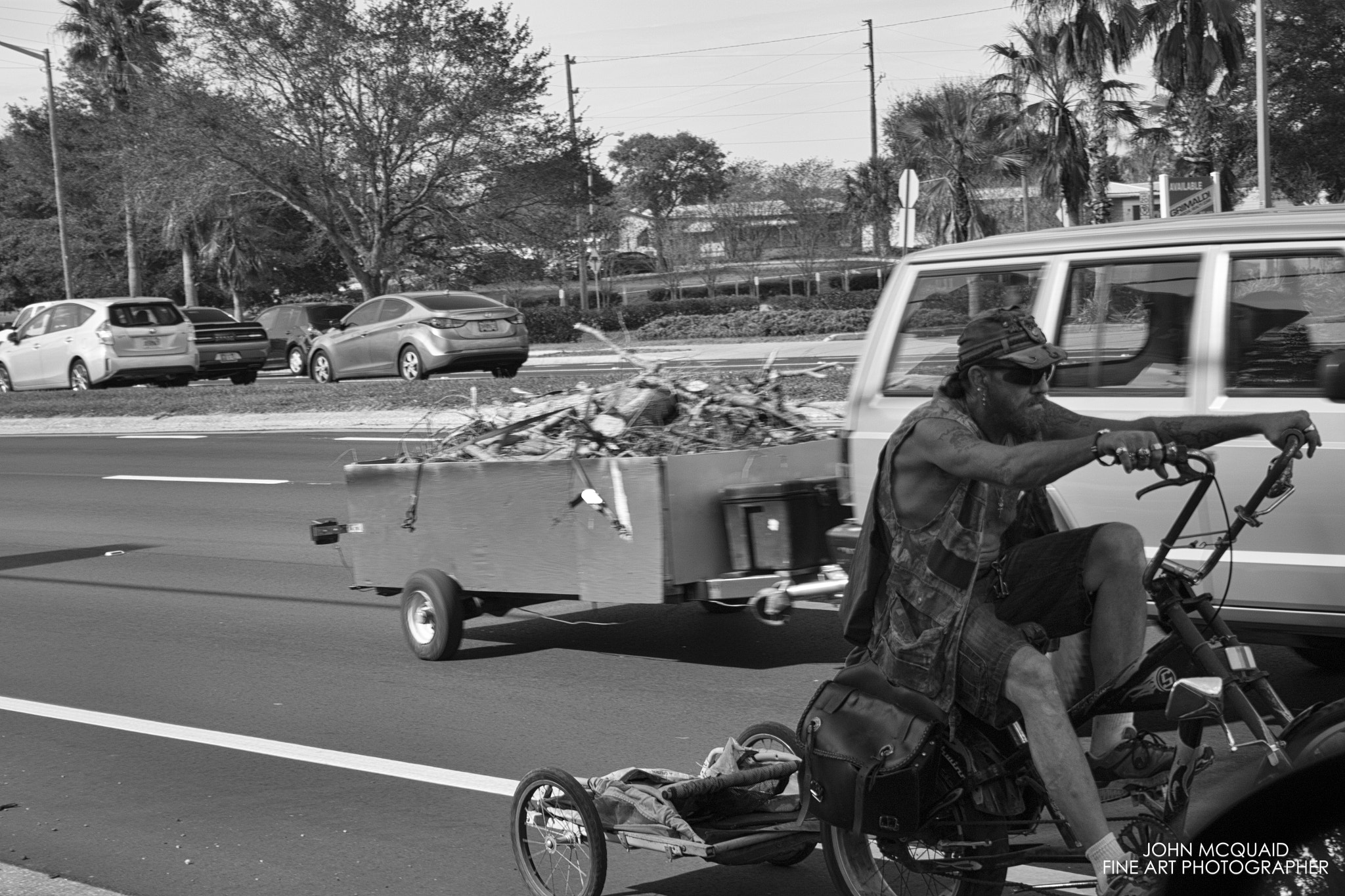 Canon EF-S 18-55mm F3.5-5.6 II sample photo. Bike man photography