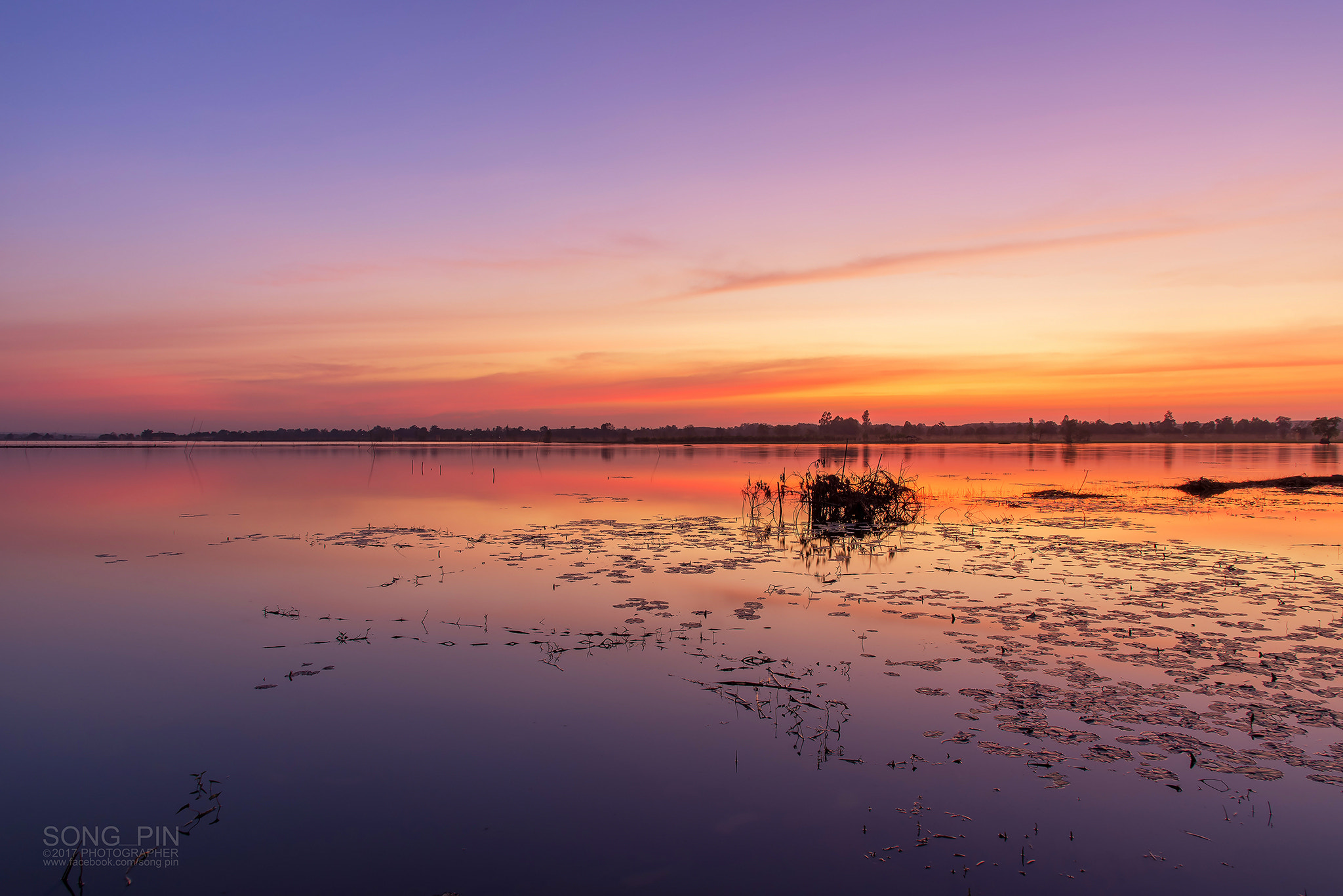 Nikon AF-S Nikkor 24-120mm F4G ED VR sample photo. Light from sunset reflected in the lake photography