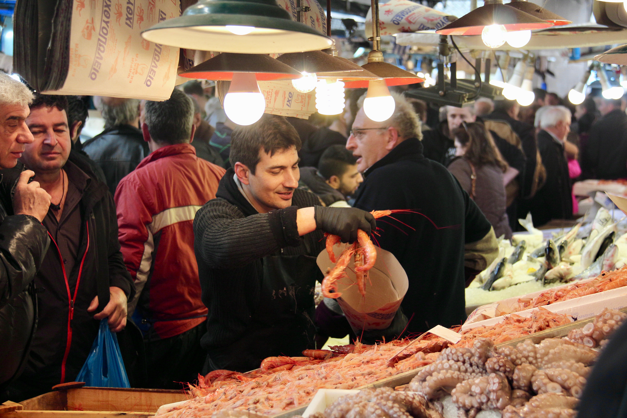 Canon EF-S 18-200mm F3.5-5.6 IS sample photo. Shrimp seller photography