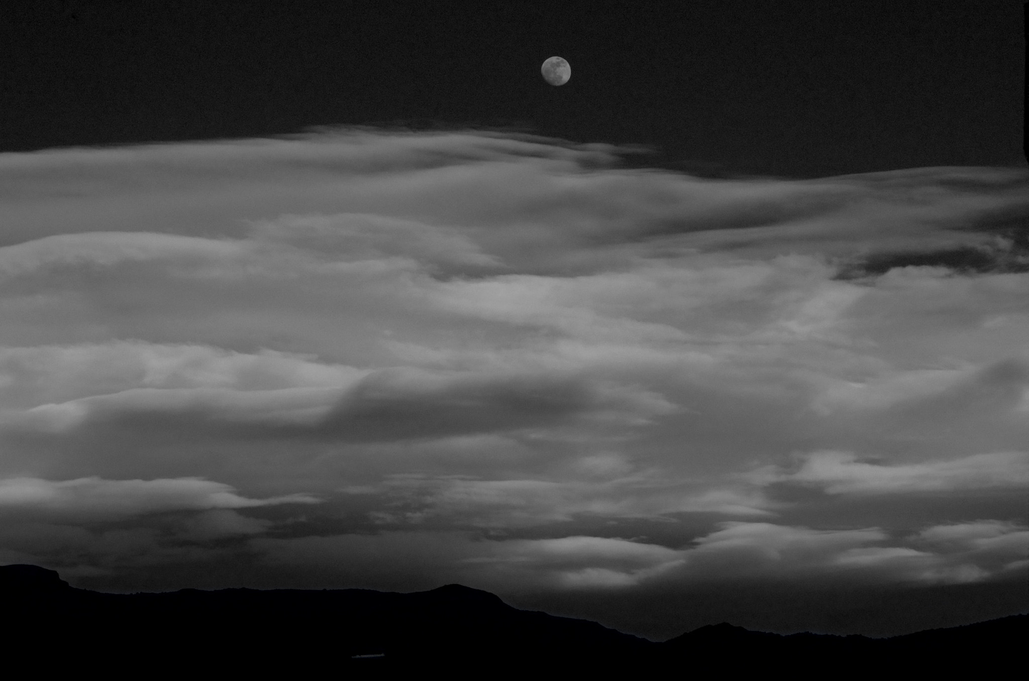 Pentax K-5 sample photo. Moon over cloud bank, southern, nm 2008 photography