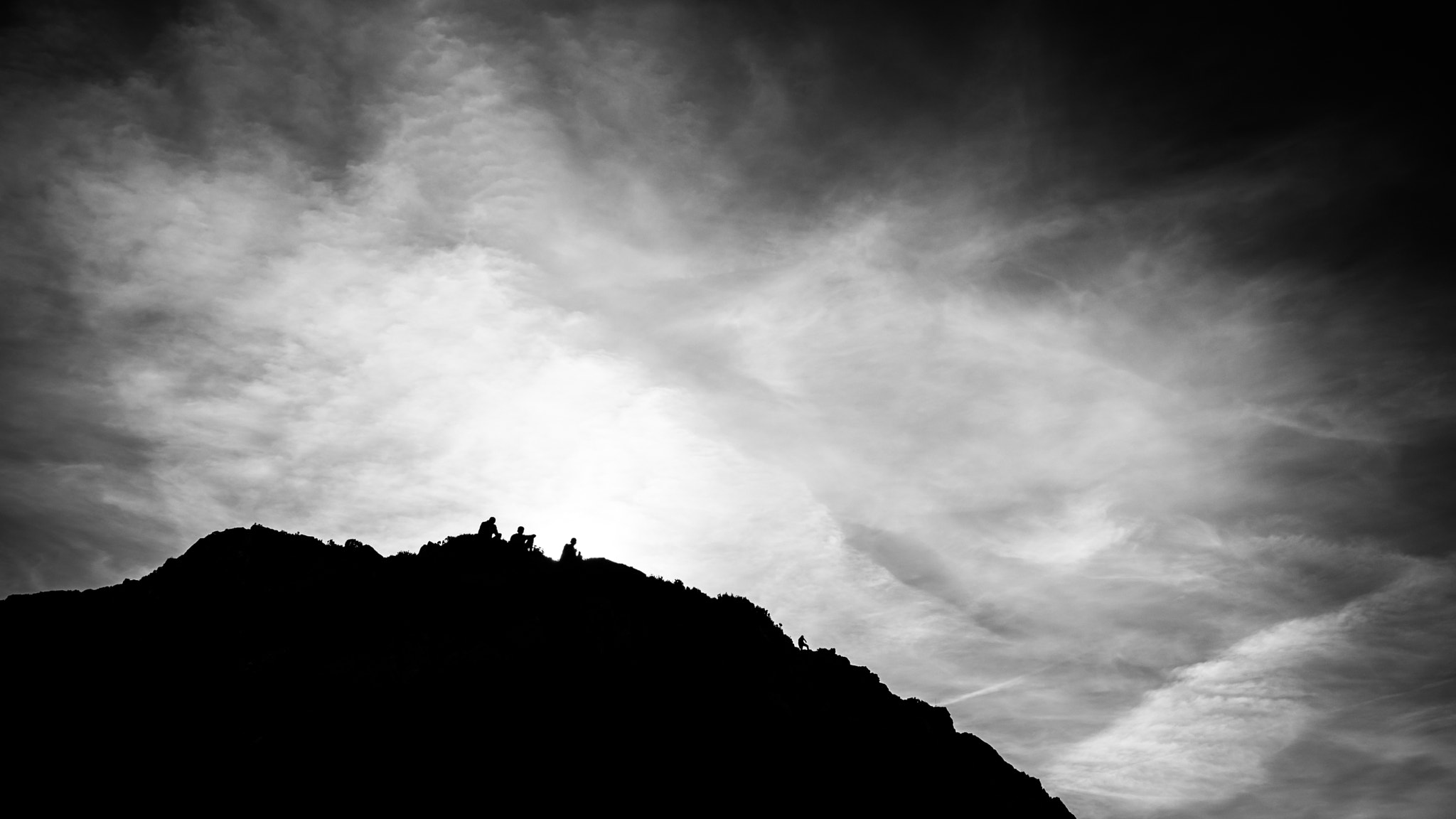 Fujifilm X-Pro2 + Fujifilm XF 23mm F2 R WR sample photo. People on the hill - howth, ireland - black and white street photography photography