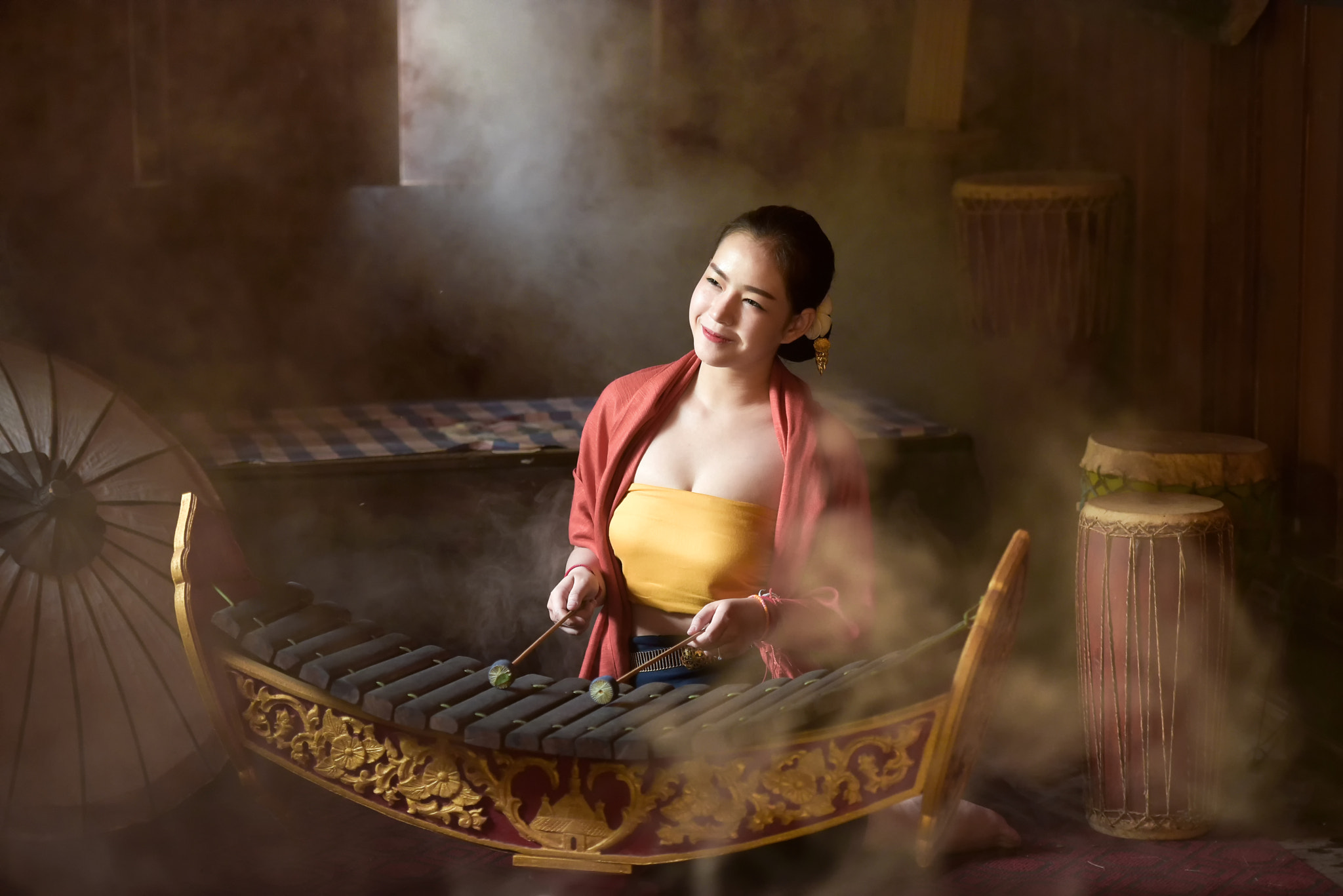 Nikon AF-S Nikkor 70-200mm F2.8G ED VR II sample photo. Young girl playing thai musical instruments photography