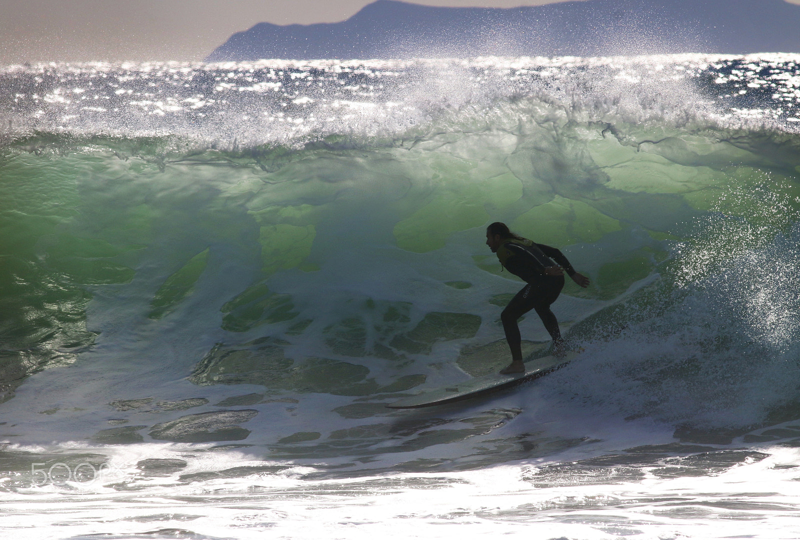 Canon EOS 70D + Canon EF 400mm F5.6L USM sample photo. Back lit surfer photography