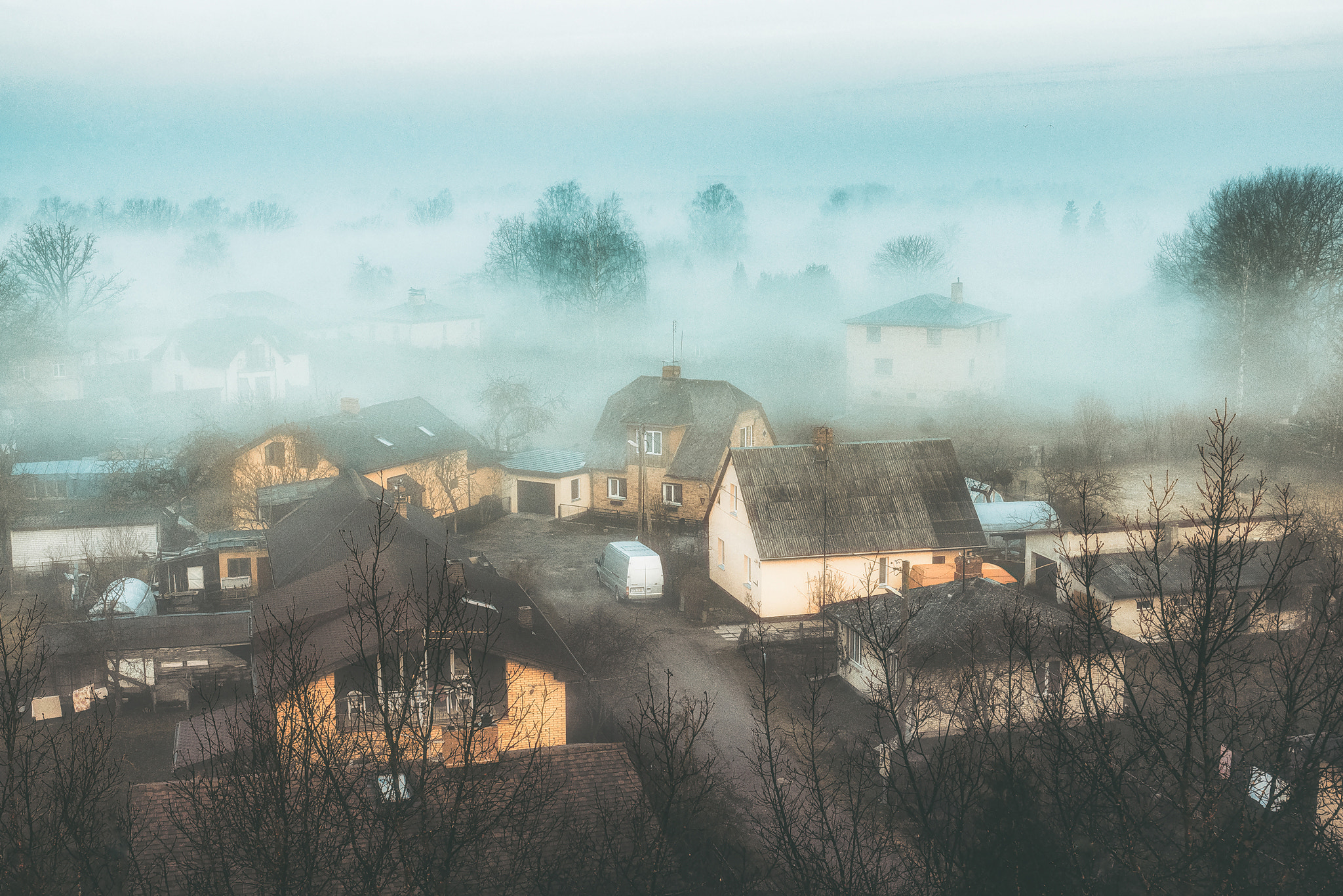 Nikon AF-S Nikkor 18-35mm F3.5-4.5G ED sample photo. Fog over town photography