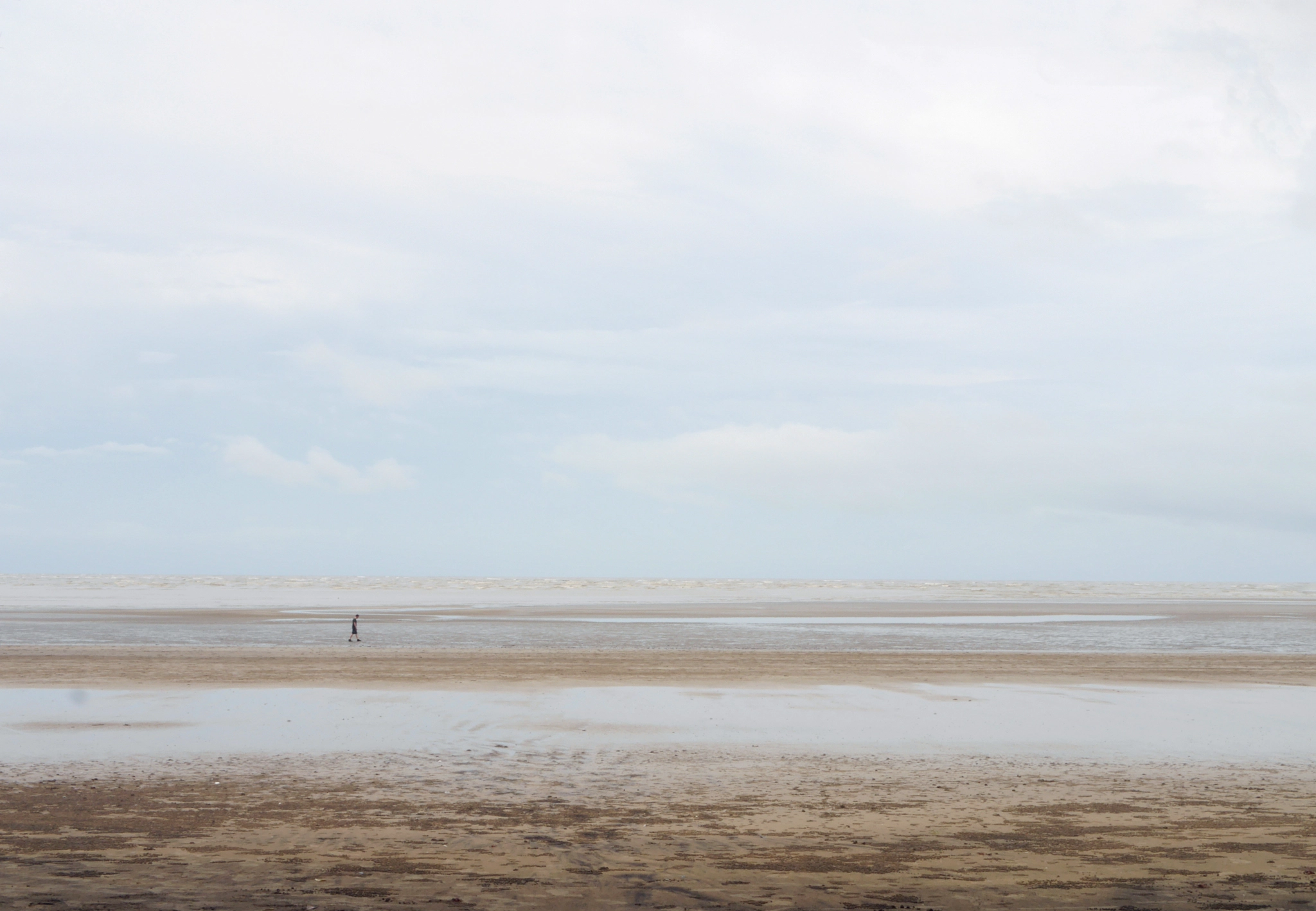 Panasonic Lumix DMC-GF6 sample photo. Solitude person walks down the seaside photography