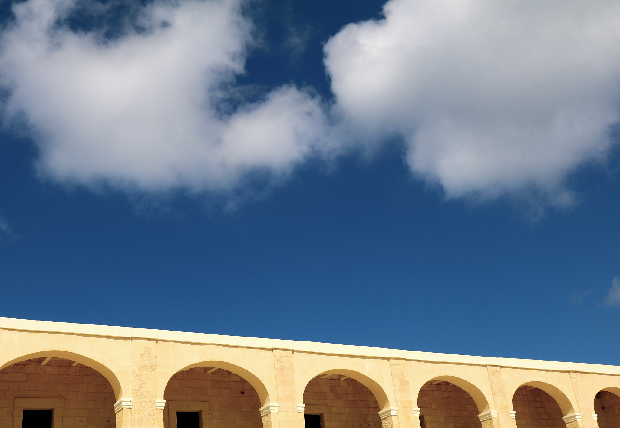 Canon EF-S 17-55mm F2.8 IS USM sample photo. Floating above the arches photography