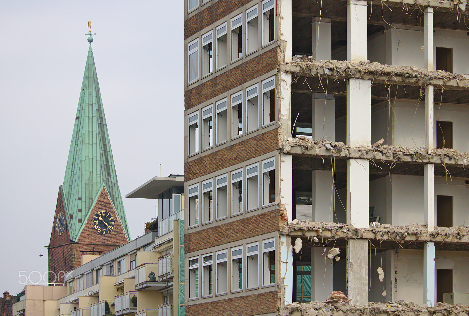 Canon EF-S 55-250mm F4-5.6 IS STM sample photo. Demolished building and church tower photography
