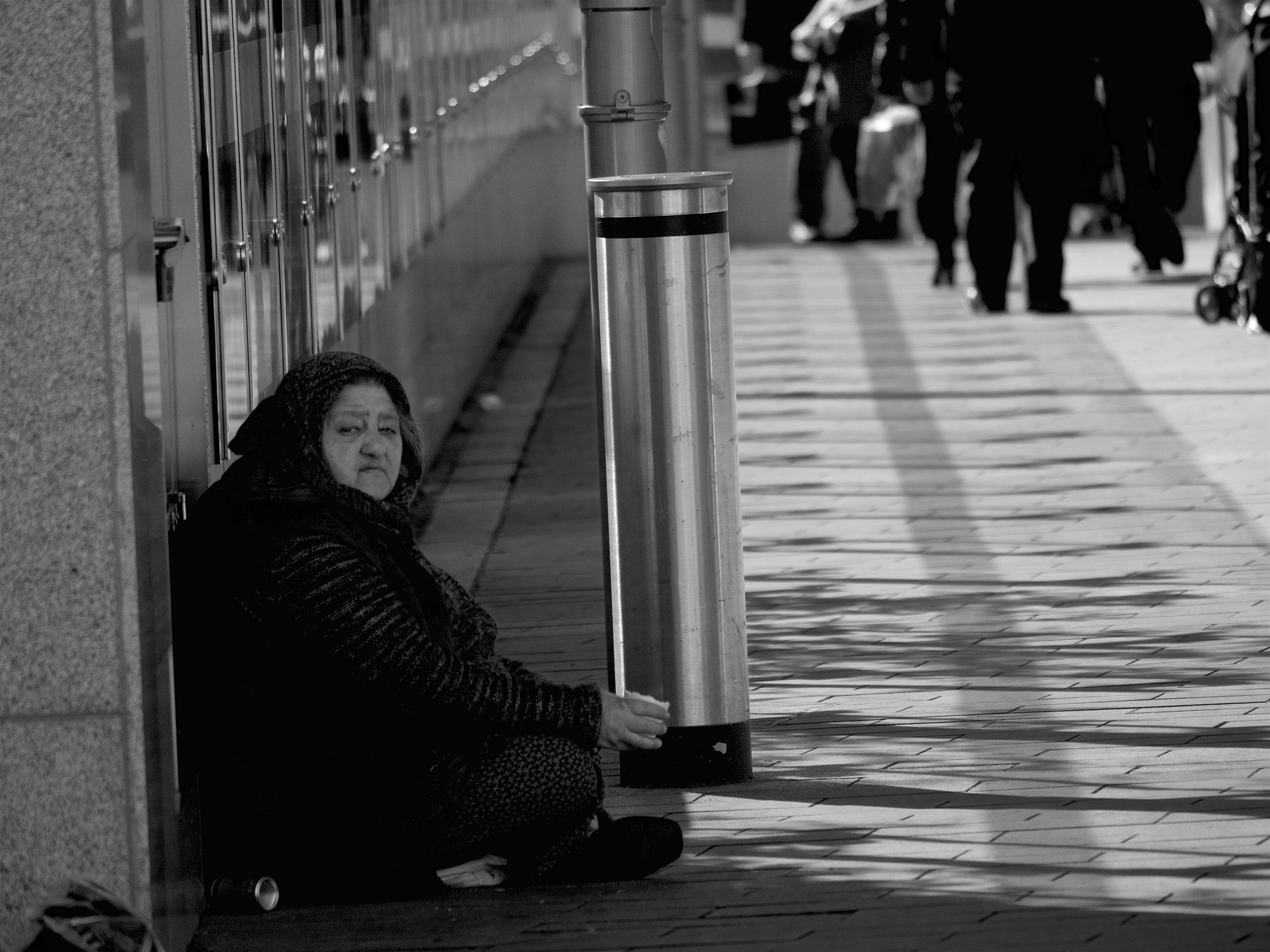 Olympus OM-D E-M5 II sample photo. Poor lady photography