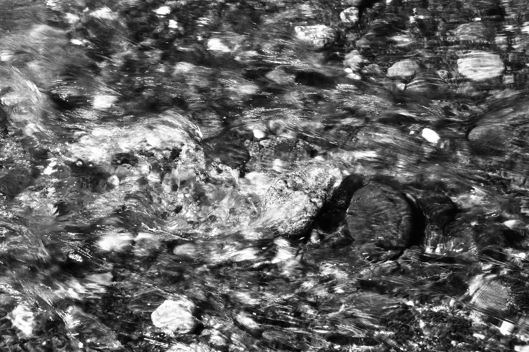 Fujifilm X-E2 + Fujifilm XF 18-55mm F2.8-4 R LM OIS sample photo. River rock photography