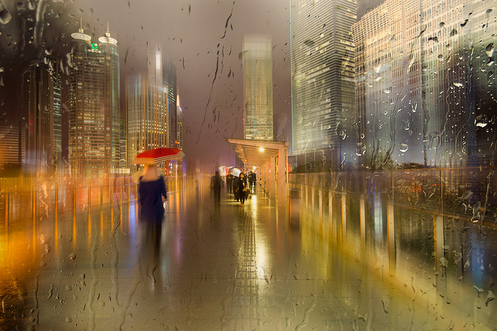 Canon EF 11-24mm F4L USM sample photo. Rainy night city on pedestrian bridge photography