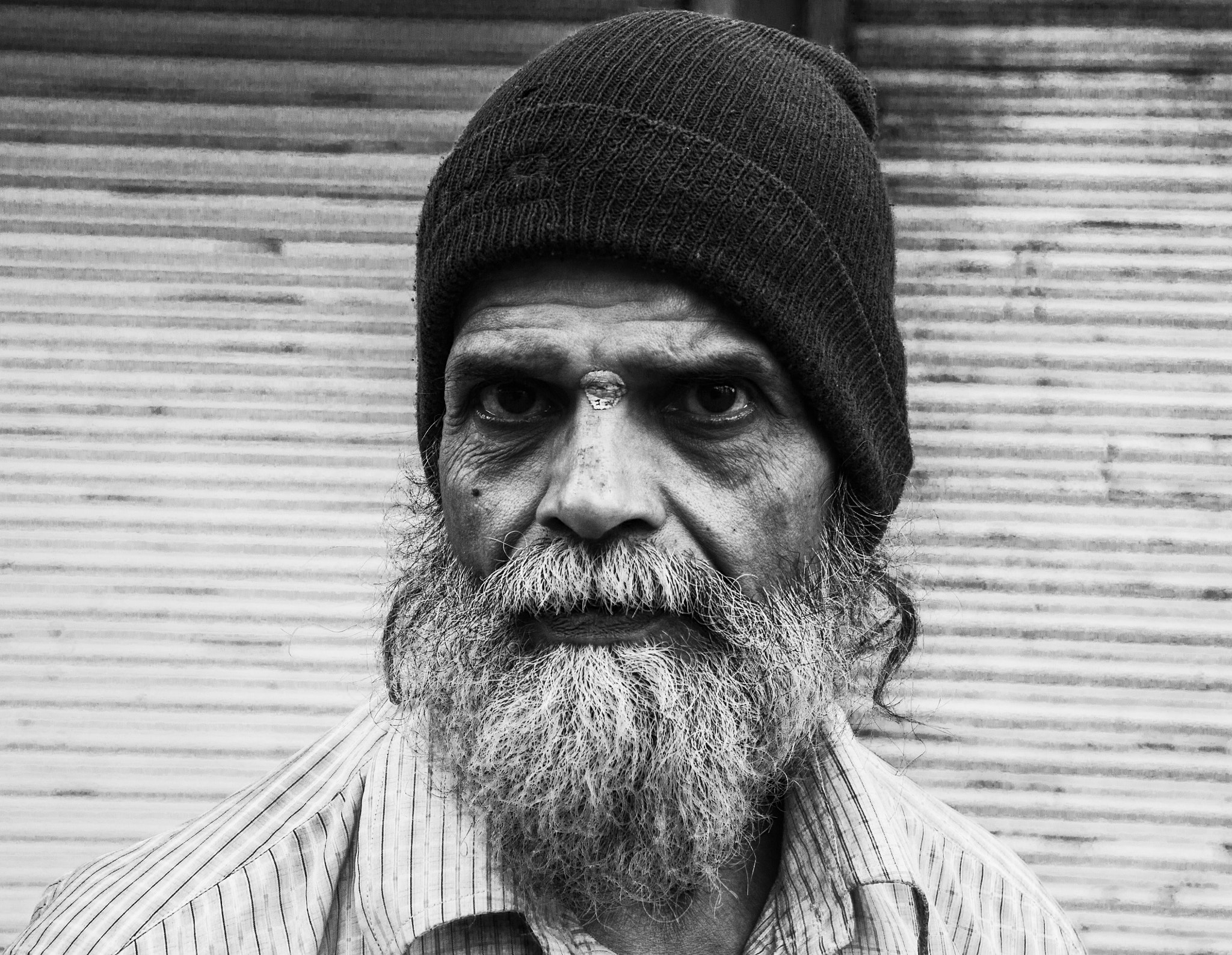 Canon EF-S 18-135mm F3.5-5.6 IS sample photo. Beard and a bindi photography