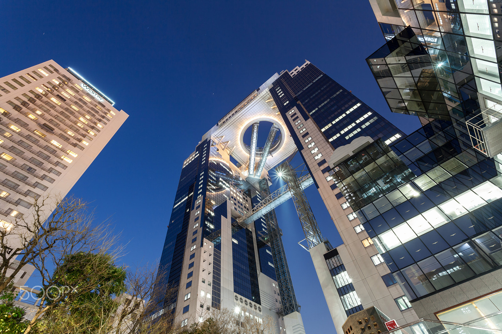 Canon EF 17-40mm F4L USM sample photo. Osaka, japan - march 19, 2017 : umeda sky building is skyscraper photography
