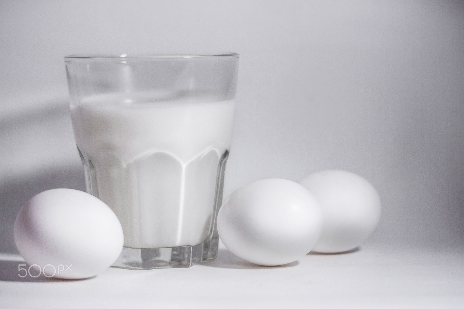 Canon EOS 7D + Canon EF 50mm F1.8 STM sample photo. Milk in a glass jar and eggs photography