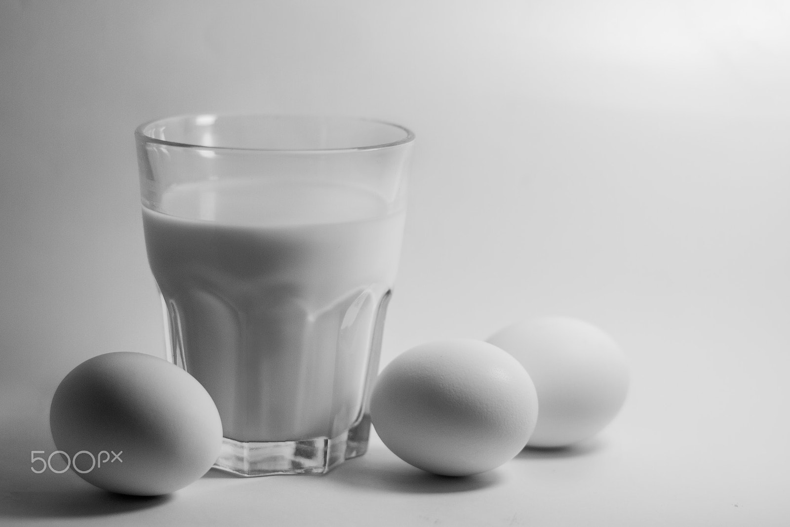 Canon EOS 7D + Canon EF 50mm F1.8 STM sample photo. Milk in a glass jar and eggs photography
