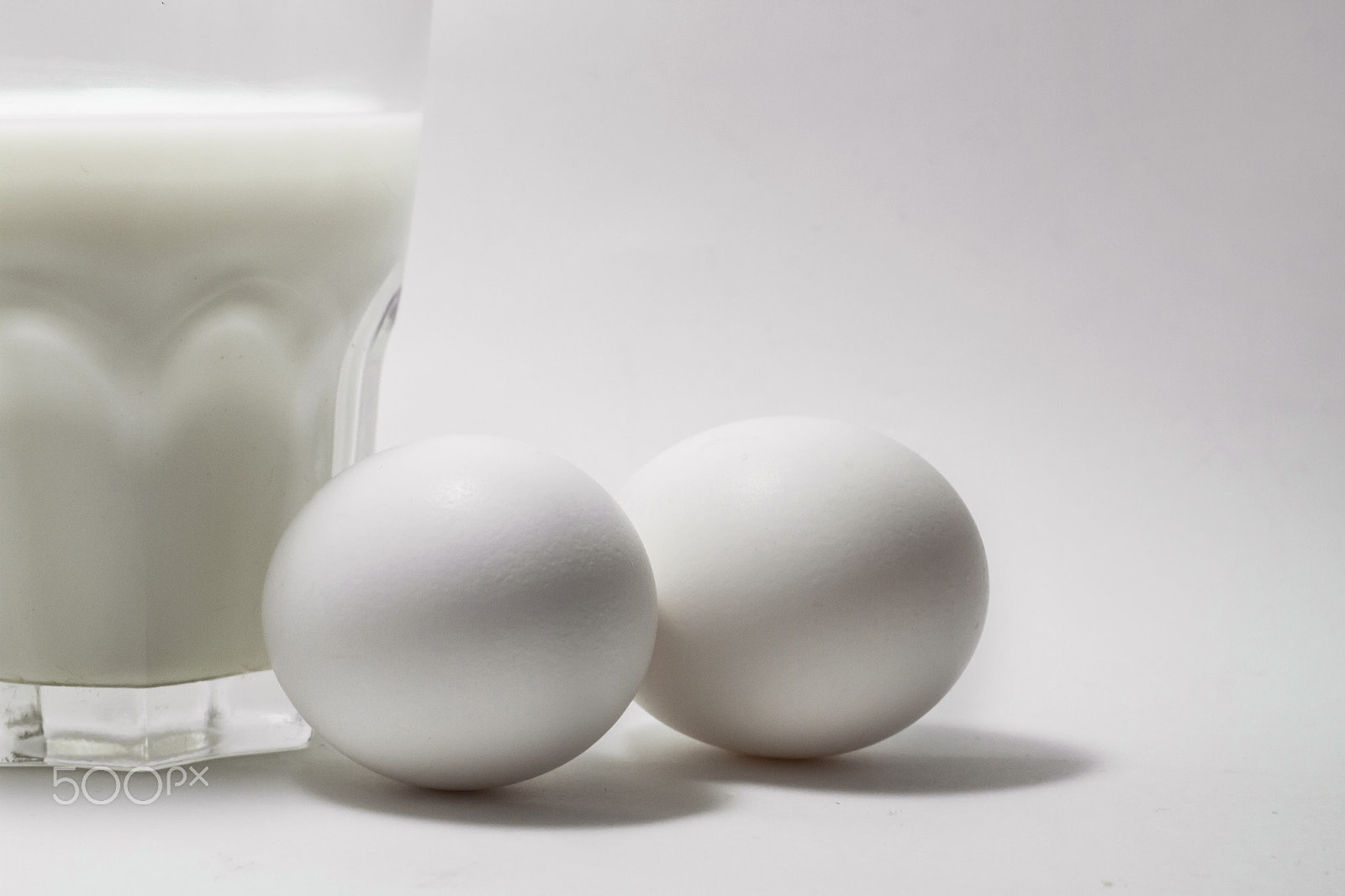 Canon EOS 7D + Canon EF 50mm F1.8 STM sample photo. Milk in a glass jar and eggs photography