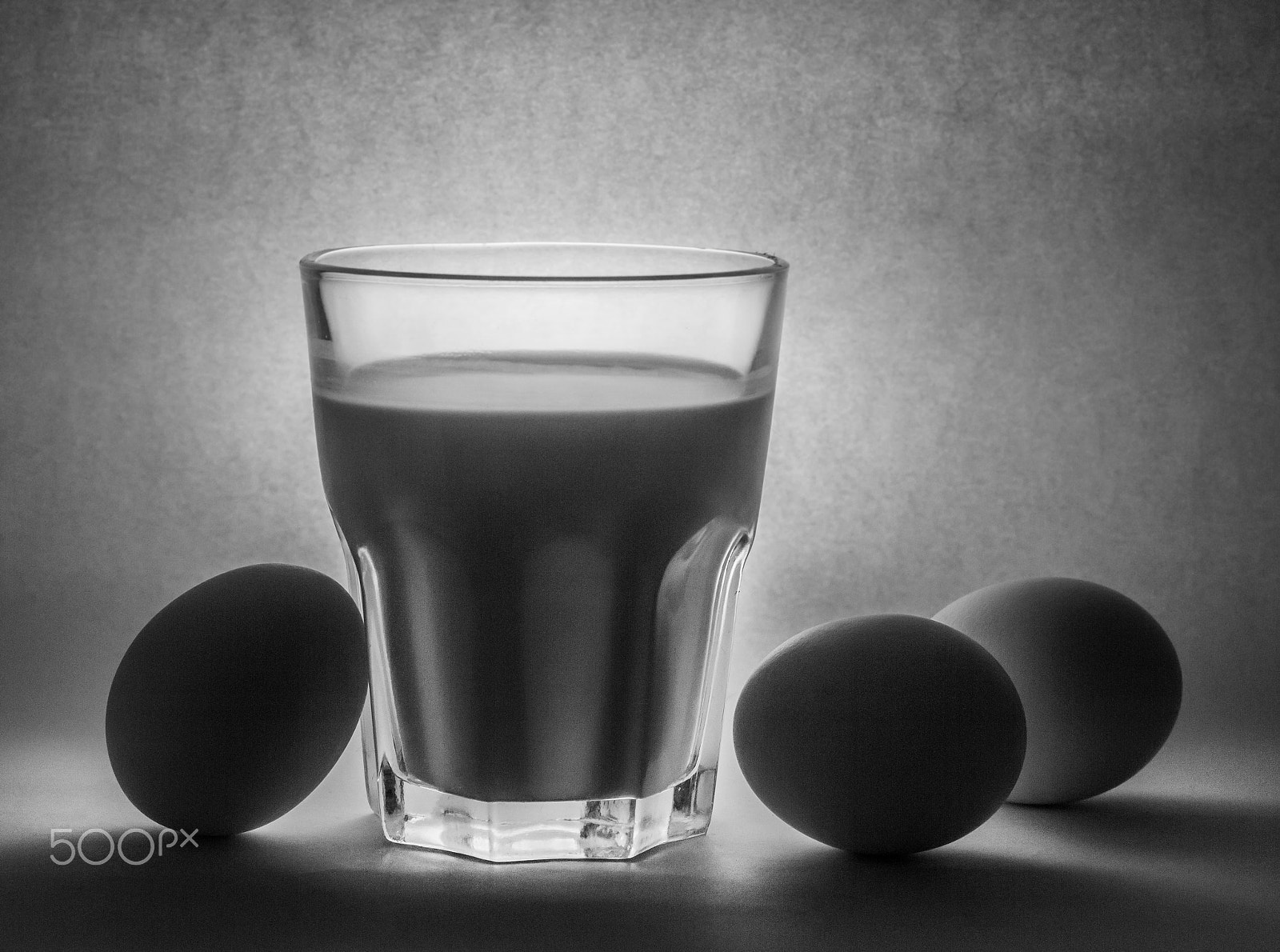 Canon EOS 7D + Canon EF 50mm F1.8 STM sample photo. Milk in a glass jar and eggs photography