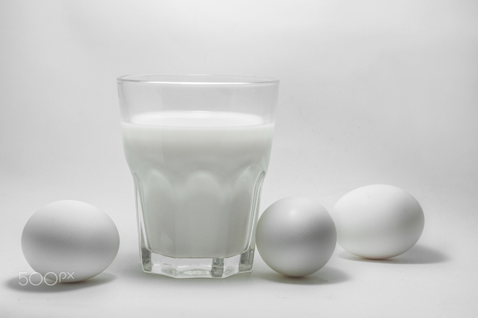 Canon EOS 7D + Canon EF 50mm F1.8 STM sample photo. Milk in a glass jar and eggs photography