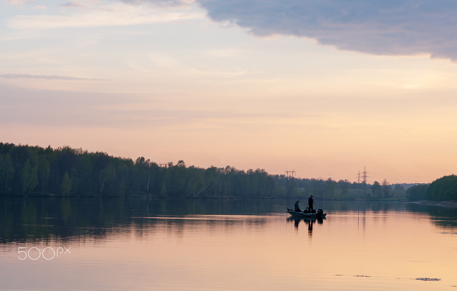 Nikon AF-S Nikkor 85mm F1.4G sample photo. Two fisherman on boat at sunset photography