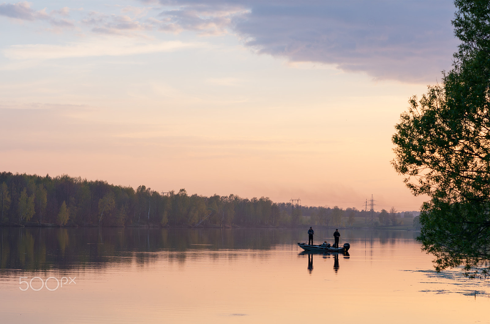 Nikon AF-S Nikkor 85mm F1.4G sample photo. Two fisherman on boat at sunset photography