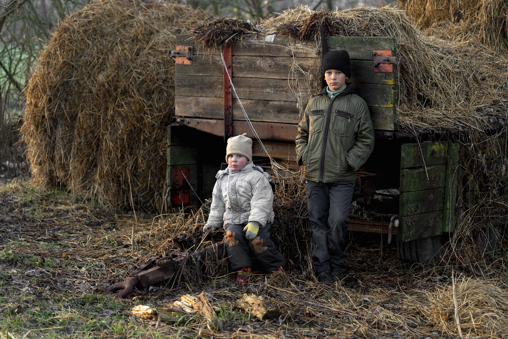 Canon EF 100mm F2.8 Macro USM sample photo. Village children playing in a straw stack photography