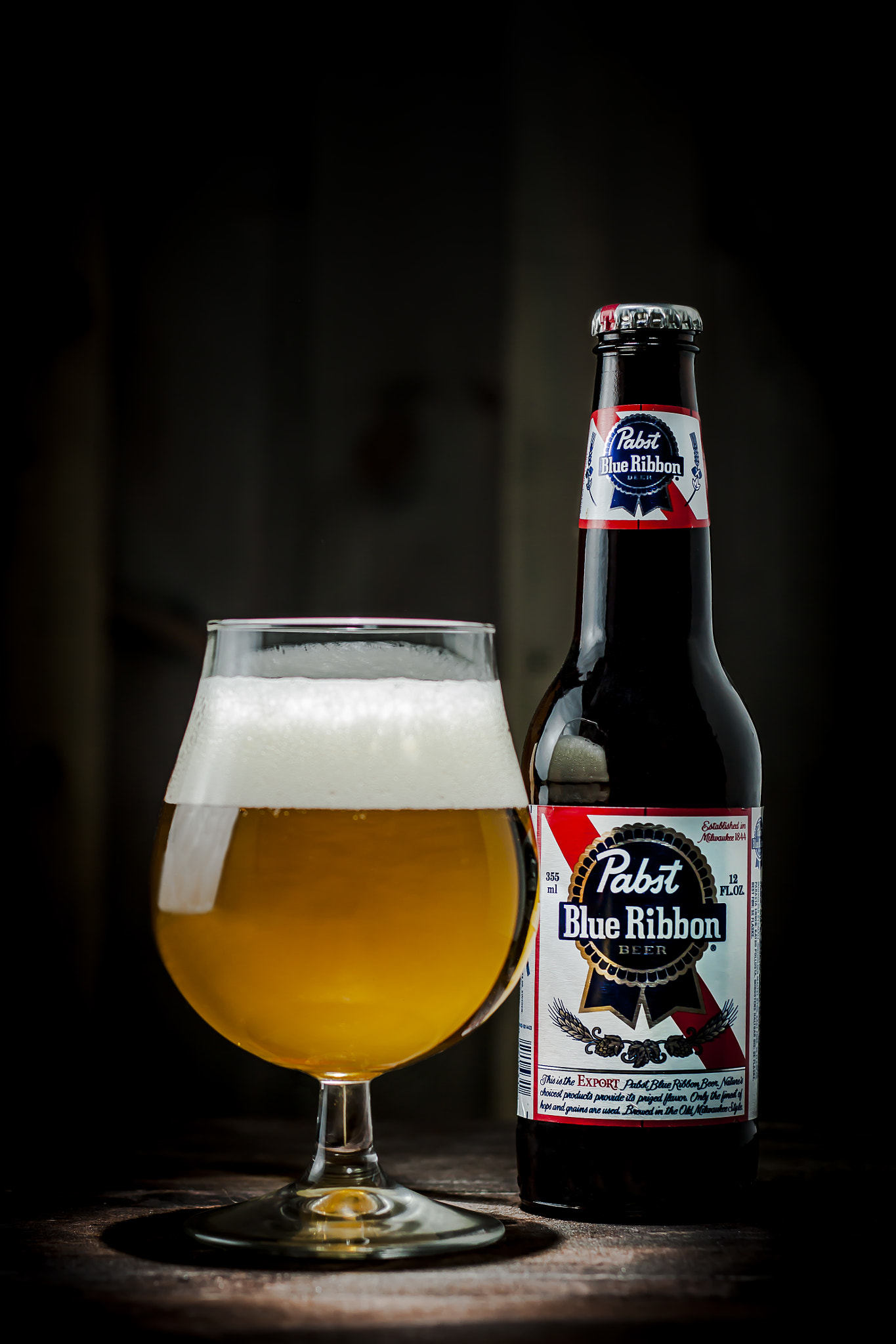 Canon EOS 50D + Canon EF 50mm F1.8 II sample photo. A cold american beer on a wooden table photography