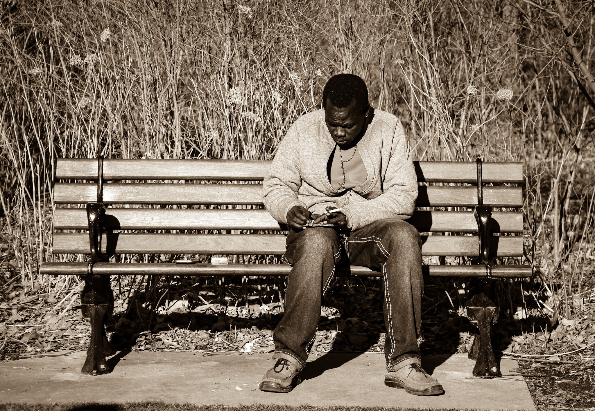 Canon EF-S 18-200mm F3.5-5.6 IS sample photo. Writing in the park bench photography