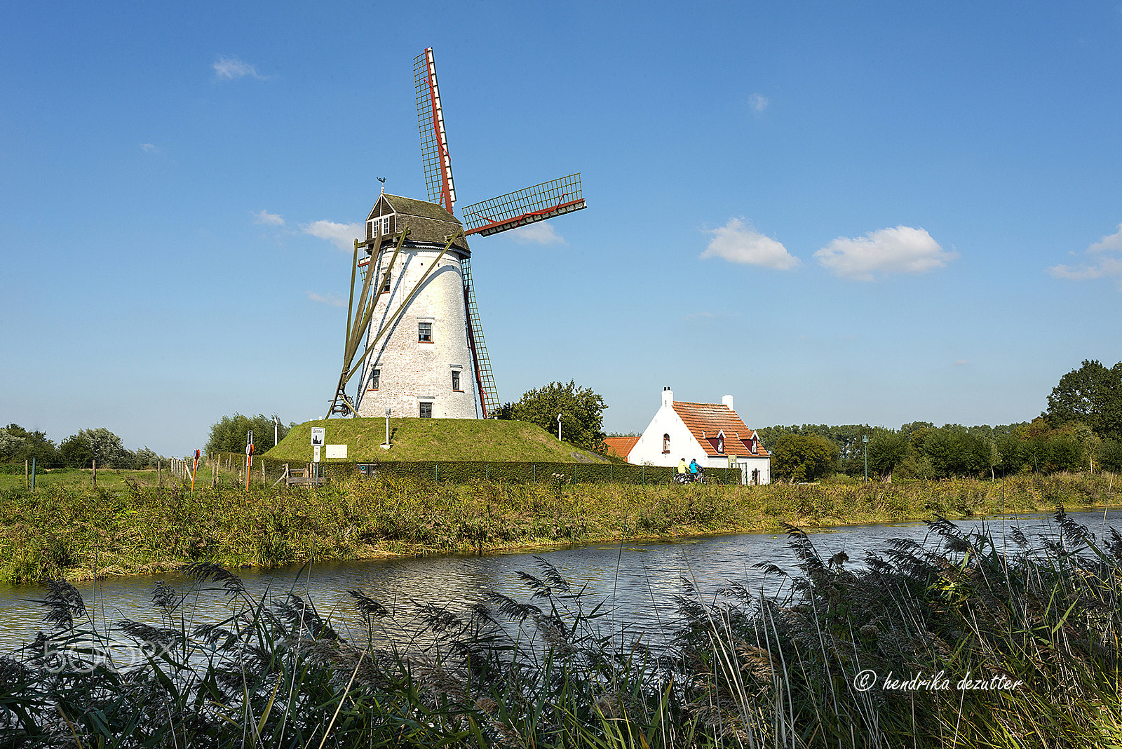 Nikon D800 + Nikon AF Nikkor 35mm F2D sample photo. Windmill in medieval village of damme, flanders photography