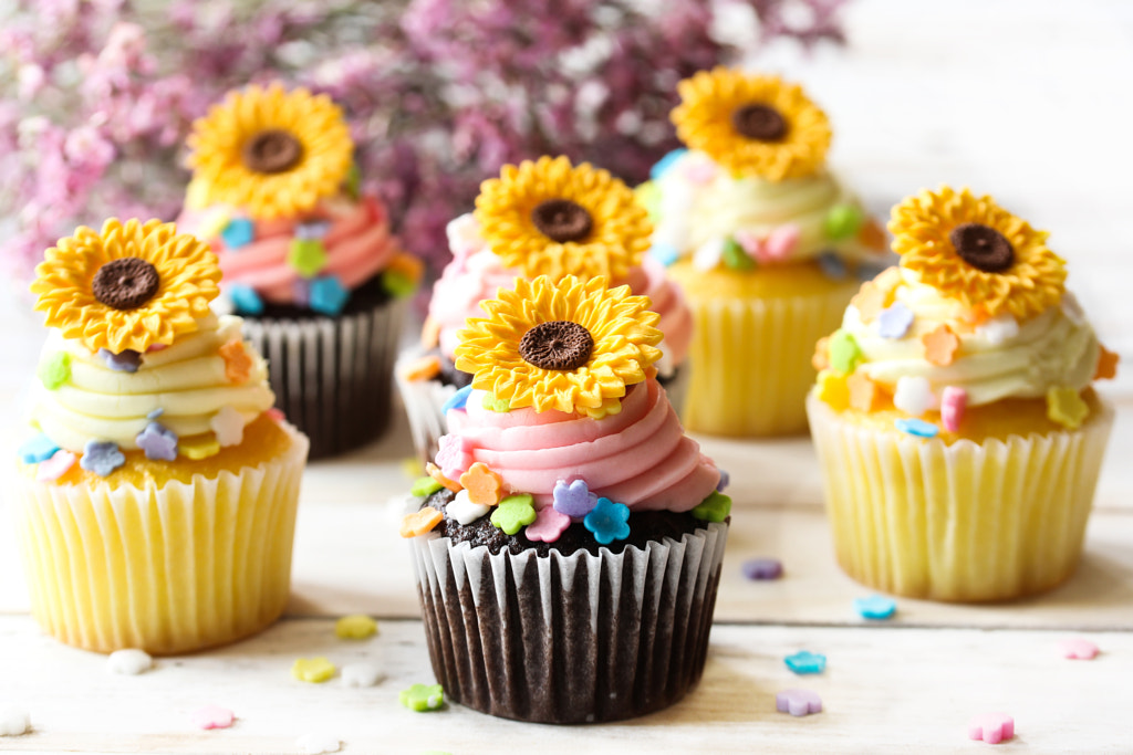 Spring Summer Cupcakes with edible sunflowers and buttercream frosting, selective focus by Vrinda Mahesh on 500px.com